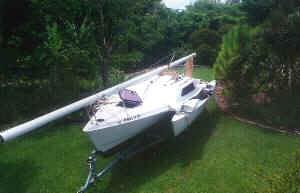 Swing Wing folds easily for trailering and docking